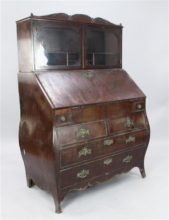 A late 18th century Dutch mahogany bombe front bureau cabinet, W. 3ft 8in. D. 2ft 1in. H. 5ft 4in.